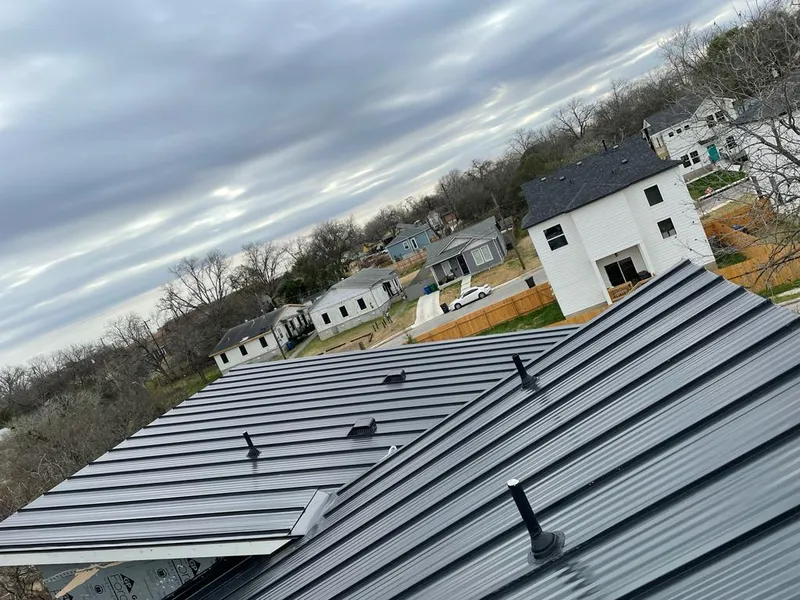 Standing seam metal roof panels with vents for Skylight Repair in Frederickson